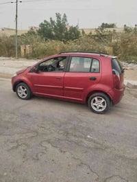 شيري اي ون سيارة موديل 12 مكفولة من ضربة  مكينة كير جدد حدادة 80بل مية...