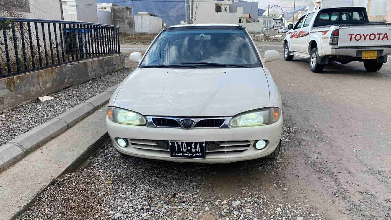 پرۆتۆن ٢٠٠٤ 
گێر تۆماتیک
ئارم پلاستیک دهۆک بە شەرتی هەموو شتێک 
گێرو مەکینە و تەبرید و کارەبایی هەمووی بە شەرت 
تەقەو رەقە
بە شەرت 
حیزام بۆیاخە جەمپێکی پێشی هەیەـ پشتەوەشی جەمپێکی هەیە ناو سندوقی نەگرتووە 
٤٠ معامەلە
*********** رانية, السليمانية
