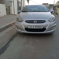 اكسنت 2015 امريكي رقم بغداد بسمي ماشيه 65 الف سياره نظيفه وجاهزا حادثه...