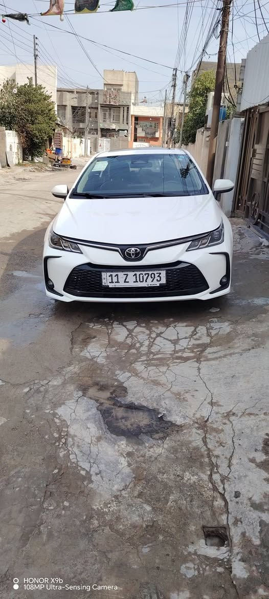 كورلا الشكل الخليجي موديل 2025 مكفول من صبغ  و تبديل ماشية 2500 كيلو فقط اخت الزيرو السيارة جلد سلايد تحكمات سبير منازل مواصفات الكورله المعروفه بيه بارد كد شبر ما مبين يم الرقم الخلفي  بسعر مناسب ب 23 مليون  الشراي يتصل ***********موجوده بي بغداد حي الجهاد
