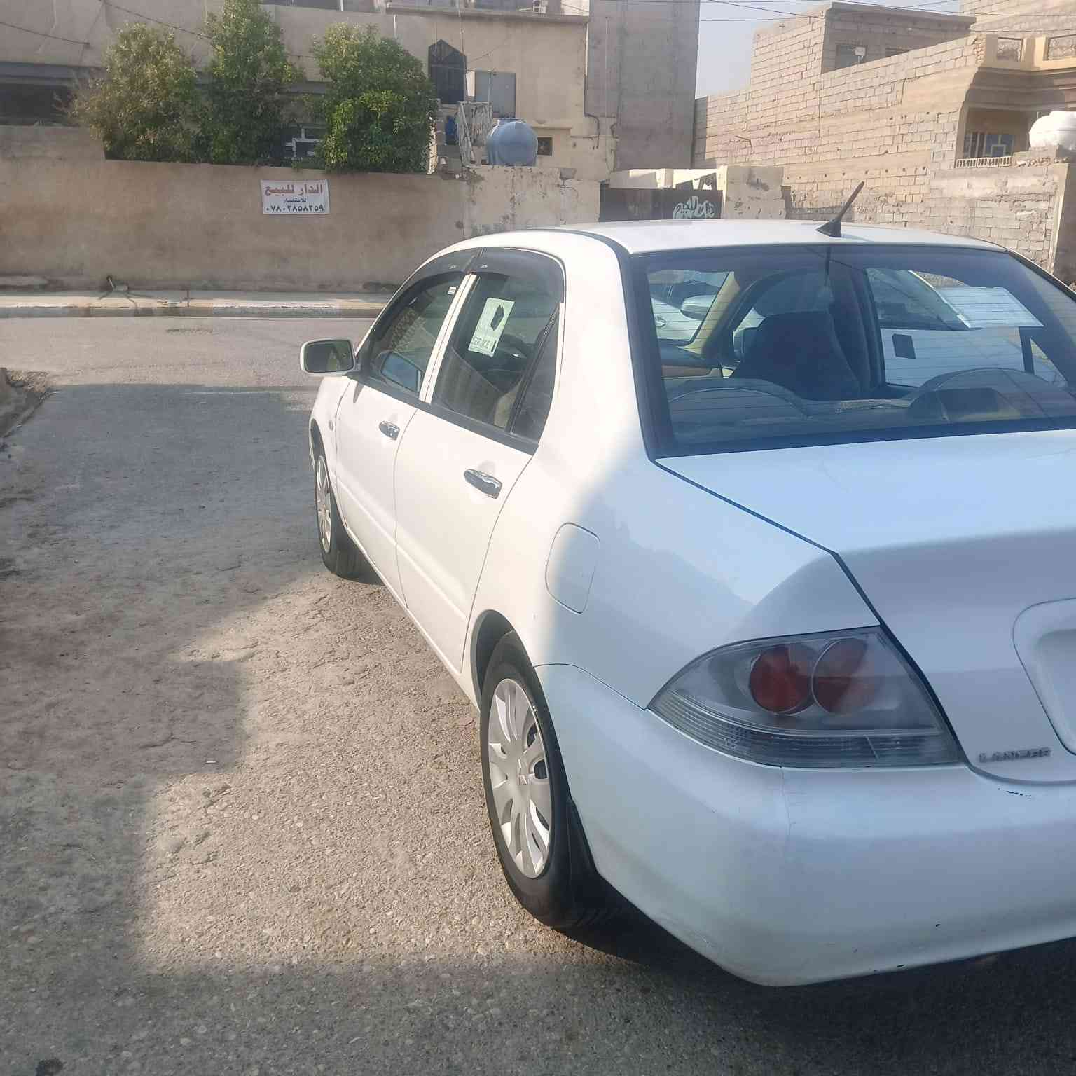 لانسر للبيع موديل ١٠ سياره جديده رقم ديالى بسمي سعر ٨٧  وبيه مجال بسيط مكاني ديالى  ***********
