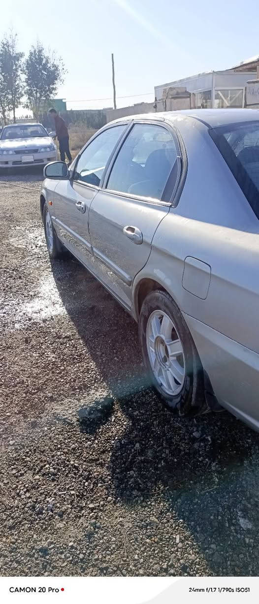 كيا اوبتما 2004 للبيع سياره جاهزه حداديه تبريد كهربائية فول مكاني ذي قار الفجر السعر 65 وبيه مجال للشراي وهذا رقمي ***********
