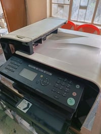 طابعة كانون ليزرية وجهين وفيدر للملازم حبرها 10الاف بيهاربط شبكة نت ور...