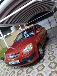 كيه ريو برايد موديل 2007 خليجي  بس بنيد صبغ والهلال الخلفي فقط والباقي...