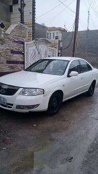 نيسان 2007رقم بغداد دولي بسمي هزة جديدة  السيارة جديده كير محرك شركة م...