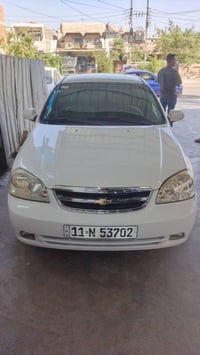 اوبترا موديل 2006 خليجي رقم بغداد الجديد بأسمي  كير . محرك . تبريد . ص...