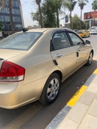 كيا سبكترا 2009 للبيع رقم بغداد سنويه لل 28 سياره مصبوغه احزام جهة الس...