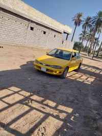 بروتون • ٢٠٠٤ • كفاله