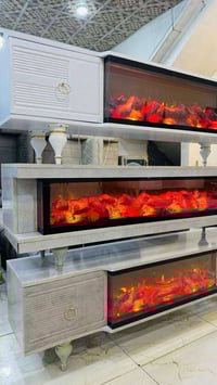 🔥 ميز تلفزيون شتوي مع إنارة نار 🔥 لمسة دفء وفخامة تكمّل بيتك بهالأجواء...