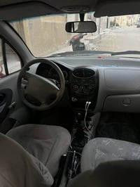 كيو كيو • ٢٠١٢ • حمراء