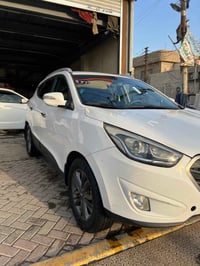 سيارة توسان موديل 2015 لون ابيض خليجي محرك 2000 كير ومحرك فول منضومه ت...