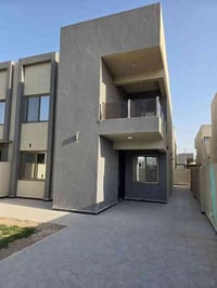 يتوفر دار للبيع بمجمع نجمة بغداد على طريق العامرية ابوغريب القديم مجاو...