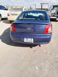 كيا سبكترا مديل 2003 سيارة جاهزه كير وتماتيك محرك تبريد شراي يتصل مو ت...