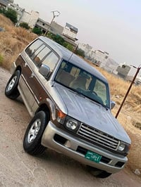 ميتسوبيشي باجيرو • باجيرو V6 • باجيرو مستر بوشي • سيارة دفع رباعي • با...