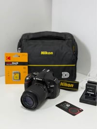 Nikon D5200 • عدسة 18-200mm • نظافة ٩٠٪