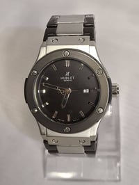 هابلوت • تيتانيوم فحمي • مكينة كوارتز