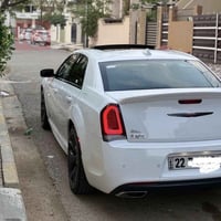 كرايسلر 300s داخل احمر موديل 2021 كندي اعلى موصفات 1/1  رقم اربيل باسم...