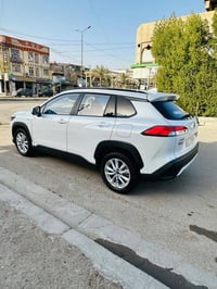 كورلا كروس موديل 2025  مكفولة بدون كلشي  ماشية 13 الف  فول مواصفات 1/1...