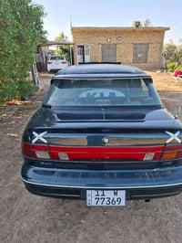 كيه سيفيا موديل 94 لون زيتوني بأسمي رقم بغداد لوحات دولي كير ومكينه كف...