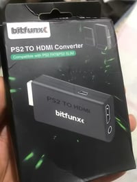 هذا محول Bitfunx PS2 to HDMI المستخدم لتوصيل جهاز بلاي ستيشن 2 (PS2) ب...