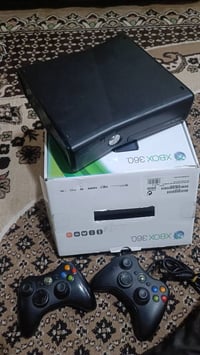 للبيع اكس بوكس 360 جديد ويا كارتونة الأصلي ويدات ثنين وبي 166 لعبة قوي...