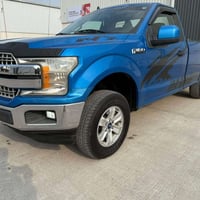 فورد f150  مديل 2020 ماشية ١٠٢ بيها بارد بالباب وتبديل جاملغ الايمن رق...
