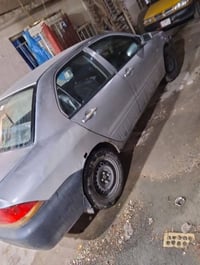 لانسر 2009 مكينة تبخر كشر جارد وبيها طخطخات بسيطة شاصي ولغود مكفولة خل...