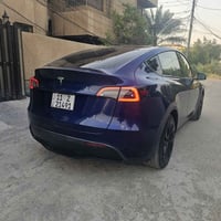 تسلا y 2023 تك ماطور  ماشي ٤٦الف كيلو وليس ميل اون لاين  صبغ بنيد بس و...