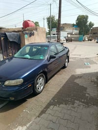 ماليبو للبيع رقم بغداد انكليزي موديل 2001  مواصفات محرك 6سلندر تلاثه و...