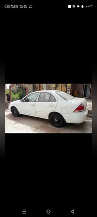 نيسان سني بدي كوري 2009رقم بغداد سياره بدون قطره صبغ بيه بارد قليل كير...