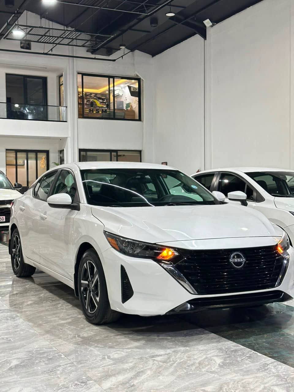 بسم الله الرحمن الرحيم 
NISSAN SENTRA SV
مۆدێل 2024
مواسەفات SV 
سەیارەکە بی سبوخە یەک جی بچووک pdr هەیە بیژۆری بەشەرتی بەهەموو شتەک 

سەیارەکە ئیرباگ ی شان و سوکانی تەقیە بەشەرت دانریتەوە دەشبوول بەشەرت 

ماوەی رۆیشتنی 16.000مایل 
                             
مەکینە و گیر بەشەرتە 

فوول مواسەفاتە ( کامیرەی دواوە ،  ،سندوقی کارەبای ،
راگری نشیوی ، حاساس ، کوشن گەرم ،  
بەسمە ، شاشە ، ئاوینە رادار ، 
6 ئیرباگ ، ئەپل کار پلەی )

سەیارەکە زۆر تەنک و ریک و پیکە  
سعر(١٤٥)مەجالکی کەمی تیدایە (***********) أربيل, العراق
