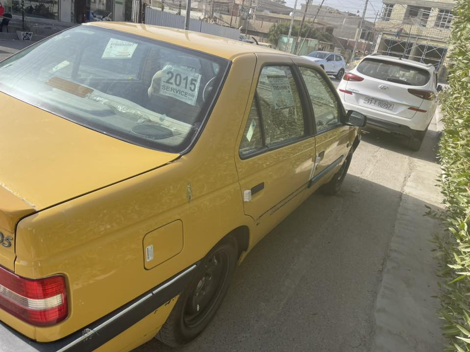 بيجو 405 للبيع كير ومحرك وتبريد شغال نقد وأقساط مكاني بغداد وبسمي ***********
