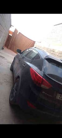 توسان للبيع رقم اربيل 2015 السعر 142وبيها مجال مكان السيارة الشعب 0773...