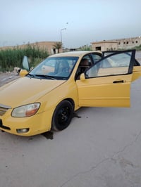 اسبكترا • ٢٠٠٩ • مكينة ٢٠٠٠