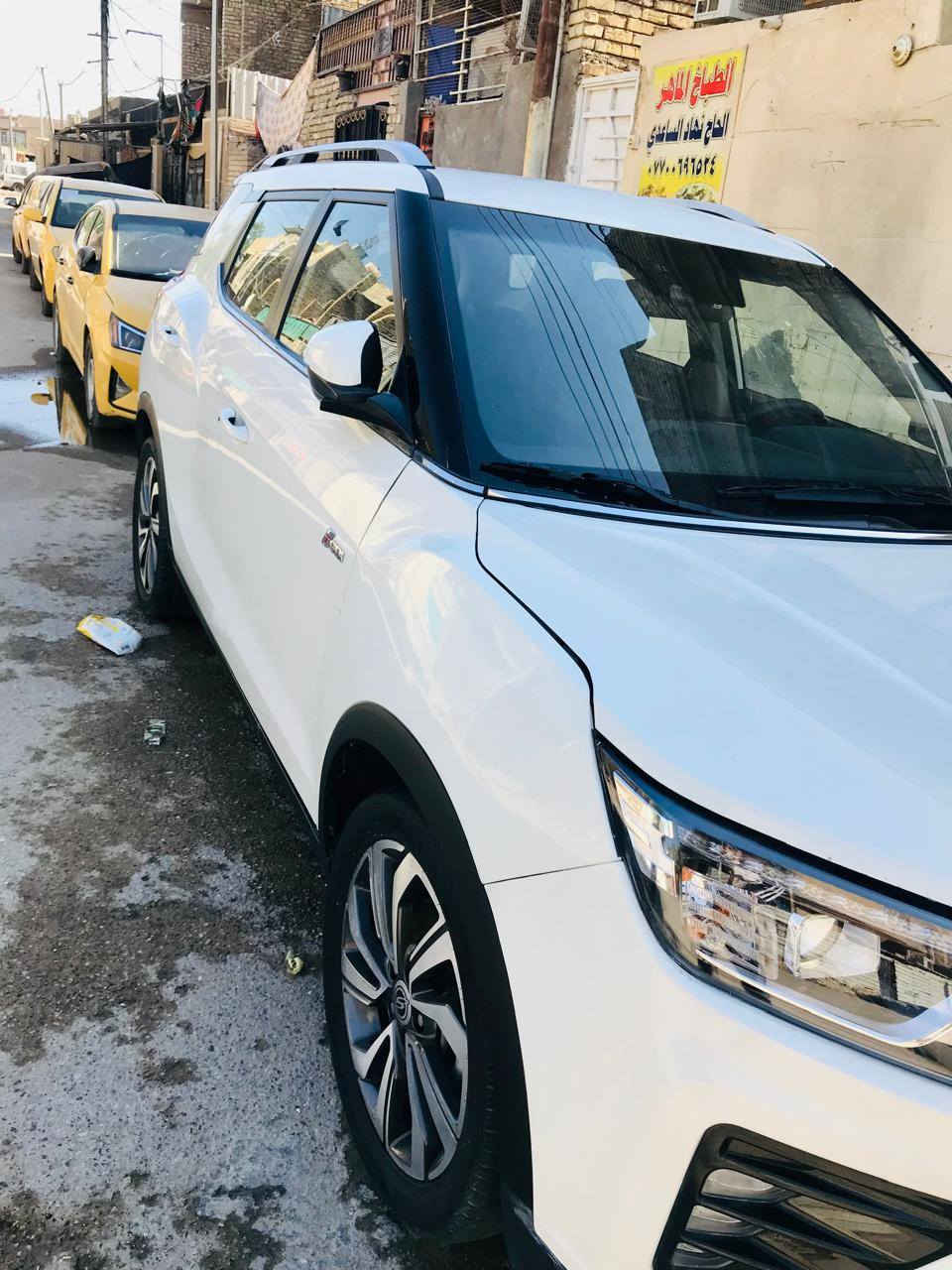 سانك يونك تيفولي كراند موديل ٢٠٢٢ فول وارد كوري مرقم بغداد بأسمي رقم وهزه جديد بيها بنيد مبدل وجاملغ الأمامي بل خشم صبغ بصمه كشن جلد وكهرباء تدفئه تبريد حتى الخلفي تدفئه شاشه كبيره رادارات حساسات مري شفط ويل كروم ١٨ ماشيه ٣٥ الف كيلو سعرها ١١٧ وبيها مجال بسيط للاستفسار *********** المكان بغداد حي اور
