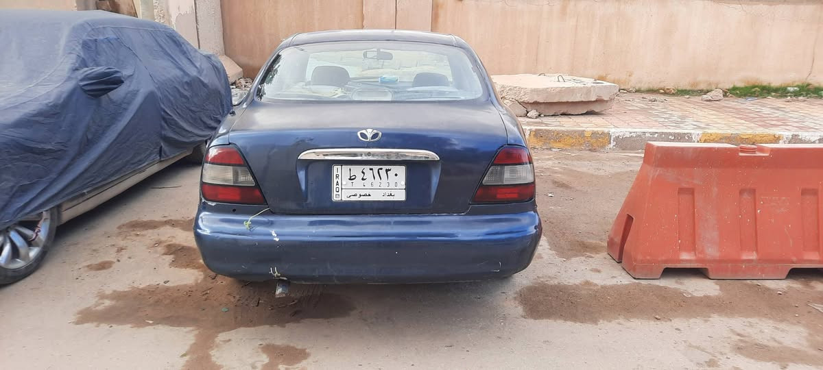 سلام عليكم  موجوده دايو لكنزا موديل 2001 مصبوغه عام رقم بغداد مشروع وطني شرط  التحويل السنويه تسقط 2027 السياره عوزها (مكينه )والباقي كوله مكفول تخم تاير حداديه كير كهربائيات كولها شغاله خير من الله السعر ٢٨ وبيها مجال للطيبين الله شاهد هذا سعرها وخسران بيها رقم تلفون ***********
