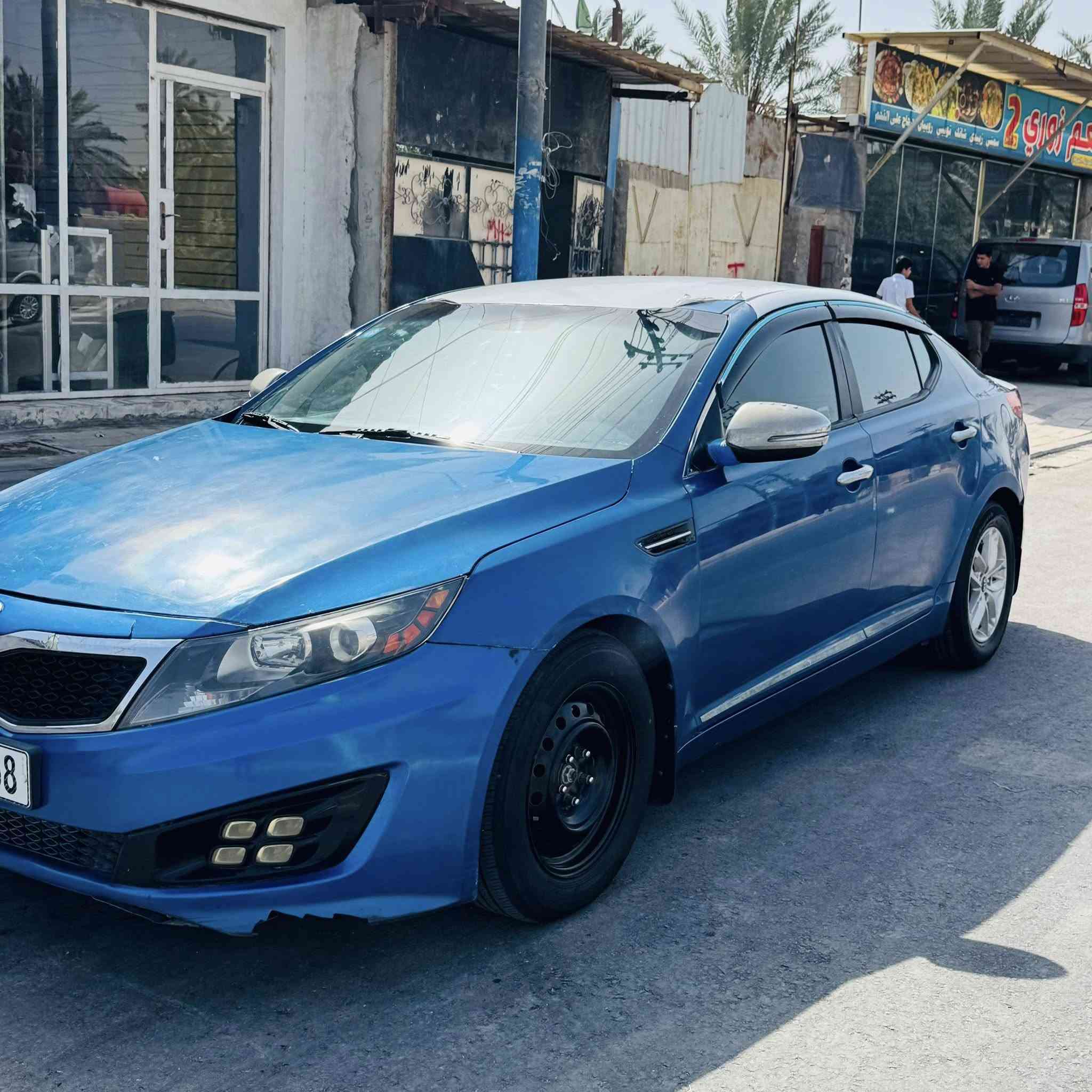 السلام عليكم للبيع كيا اوبتيما 2013 وارد امريكي فول عدا الفتحه كروز سرعه ومثبت تبريد قطعتين تخم تاير تبريد ثلج حداده جديدة سعر 93 حادث جاملغ وبنيد وبيهه مكانات صبغ قليله مكاني البصرة المدينة هاتف: ***********
