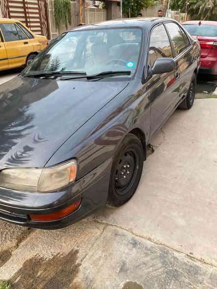 السلام عليكم من رخصة الادمن كرونا موديل ٩٢ محور سيارة صبغ عام للجماليه فرن درجة اولى  كير محرك ع الفحص تخم تايرات باتري جديد رقم بغداد انكليزي مميز السعر ٥٢ عنوان بغداد الاتصال *********** بغداد
