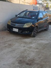 عندي سياره جلي ام كي موديل 2013. ادور فوتون مراوس رقم بغداد 0771029248...