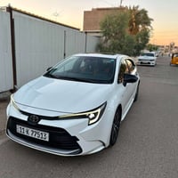 كورلا هايبرد 2025 فول مواصفات كشن كهرباء  ماشية 13 الف مكفولة من الصبغ...