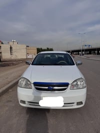 للبيع اوبترا 2011 رقم بغداد بـ اسمي المكان بغداد وبيهت قطعة صبغ للاستف...