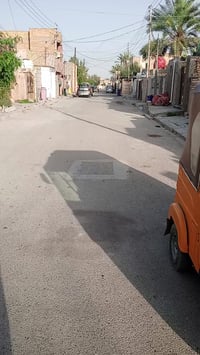 قطعة ارض مساحة 100م  عليها بناء غرفة نوم وحولي مطبخ وصحيات .. منطقة ال...