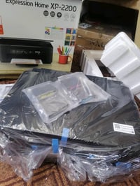 طابعة ابسونxp 2200 ملونـة جديدة امزون بريطاني UK و كاترج الحبر اربع ال...