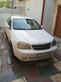 اوبترا 2011 خليجي لون أبيض دواخل رصاصي الشركة العامة للسيارات رقم انكل...