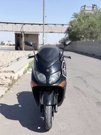 T MAX 2008 نوزل دراجه كامله رقم بغداد شرط التحويل كلشي ما ناقصها ممشه5...