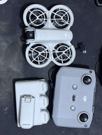 درون DJI NEO • اربع بطاريات • حساس سفلي