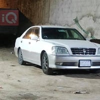سياره  تيوتا جنون (ملكه ) ابيض لؤلوي محزم  موديل 2001 مواصفات مراءه شف...