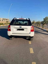 كية اسبورتج 2010 السيارة نظيفة المحرك والكير نضيف   الكشر نضيف بس بيها...