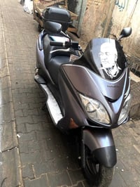 DUwII  السلام علیکم (هوندأ فورزة 0/8) الدراجة مال مزاد داخله من الخارج...