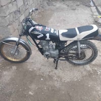 دراجة • مجهولة